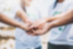 close-up-people-volunteer-teamwork-putting-finger-star-shapehands-togetherstack-handsunity